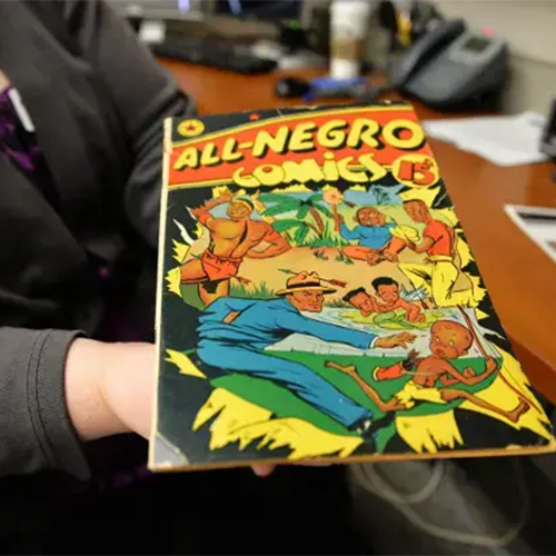 the image shows a comic book cover titled All-Negro Comics laid out on the hands of a VCU Libraries employee