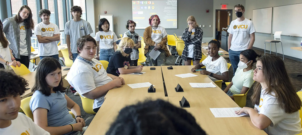 High school students at the VCU Summer Camp in Philosophy participate in a mock trial at the Academic Learning Commons at VCU in July. Among several activities during the weeklong camp focused on the concept of justice, the students discussed with VCU faculty and students what guilt 