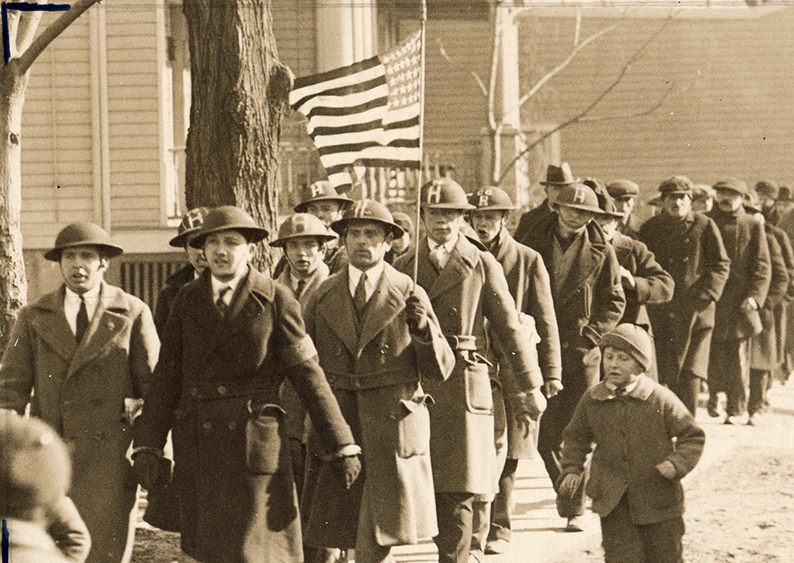 Striking laborers march in Passaic, N.J. in support of the eight-hour workweek, 1926. Image from the American Labor Museum.