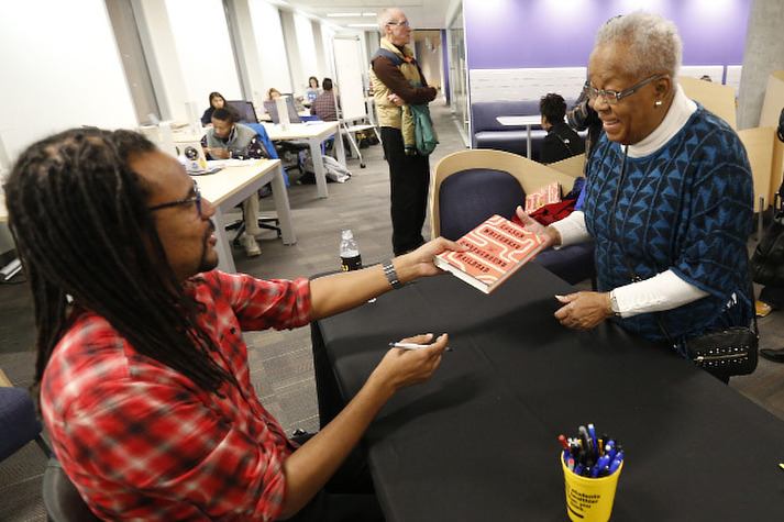 Book signing at 15th annual Black History Month lecture