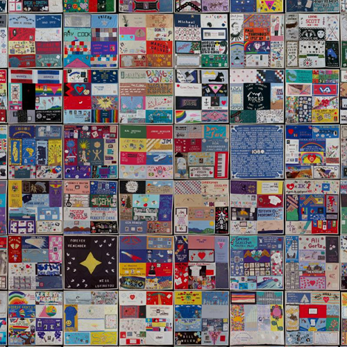 the image shows a digital viewing of the AIDS memorial quote, each square shows a different name and has its own design in an array of colors
