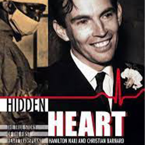 the front of a movie poster showing a man smiling on one side and a masked surgeon on the other with the words Hidden Heart written across the front