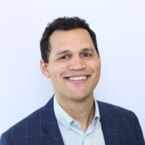 Headshot of a man in a suit