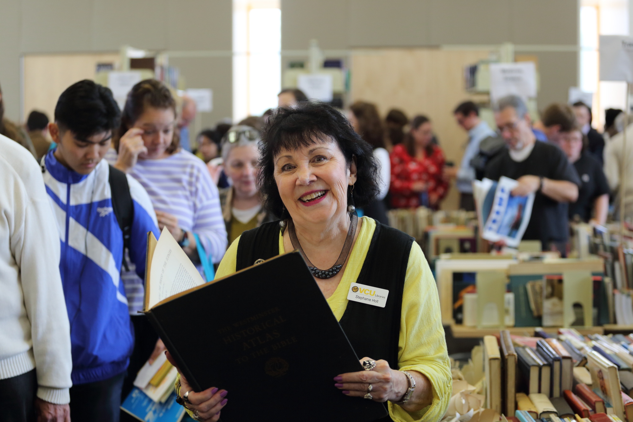 Friends of VCU Libraries Board member Stephanie Holt at the annual book sale