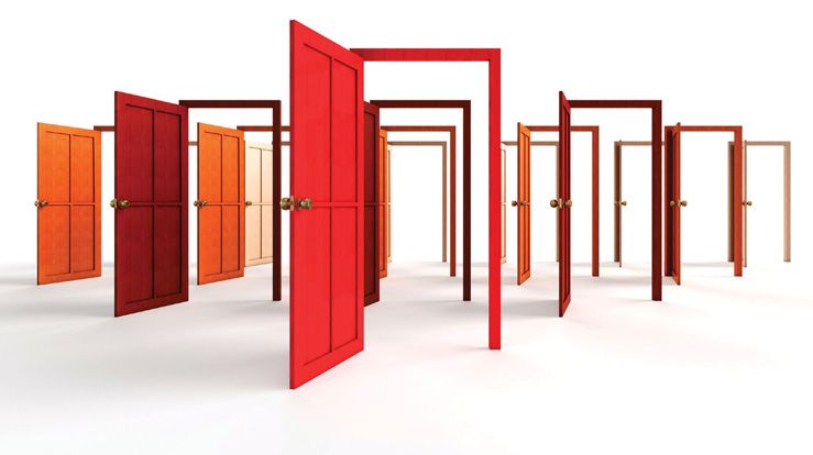 Multiple red door frames with open doors in an all white room